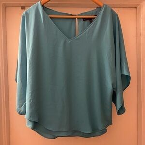 White House black market blue Flowy‎ top size XS